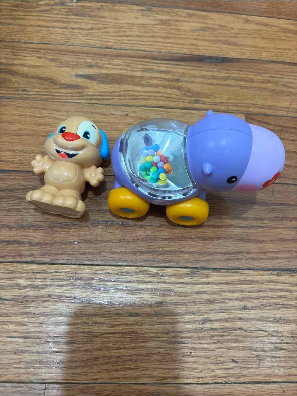 Fisher-Price Purple Hippo Rattle Pull Toy with Yellow Wheels & laugh & learn pup